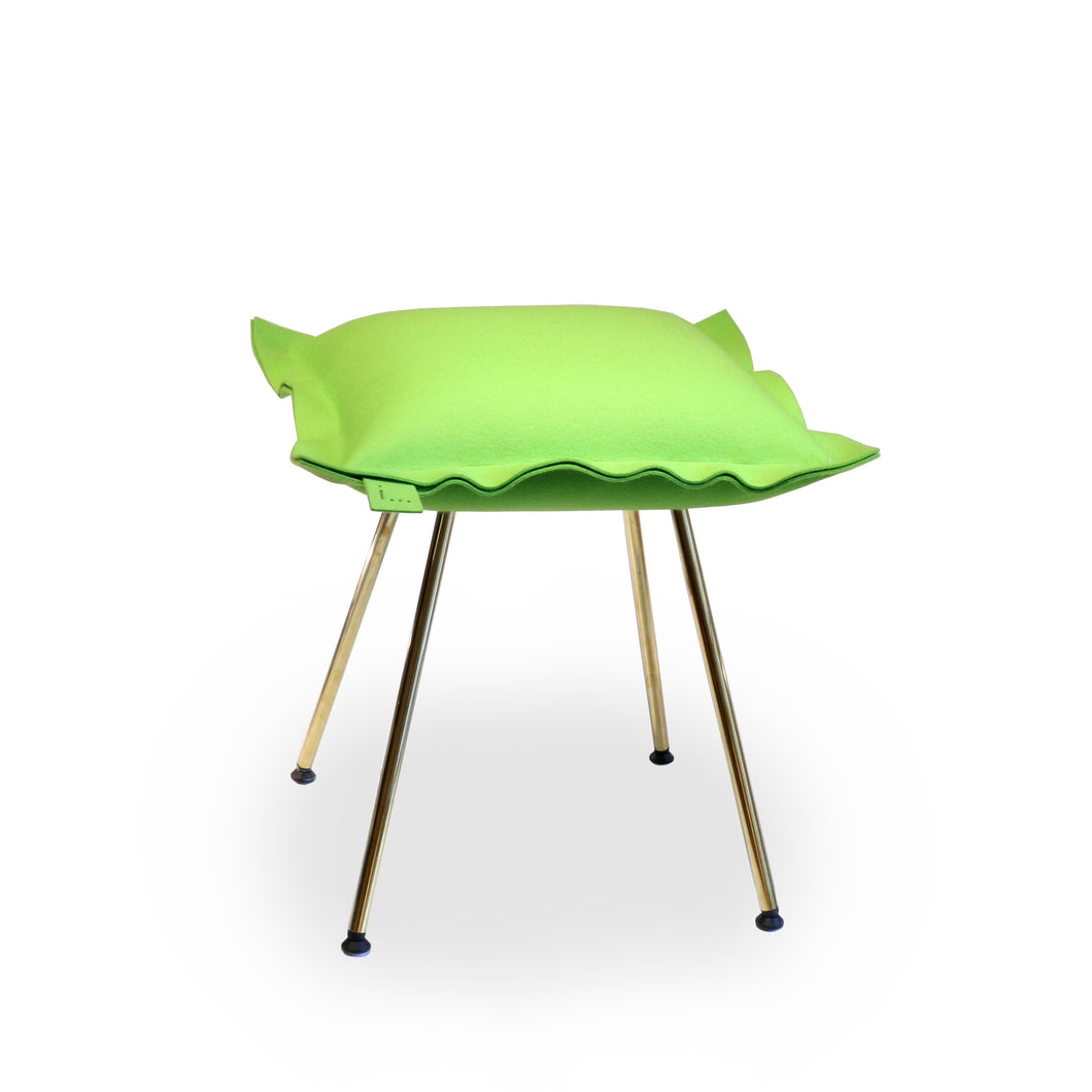 istool by Deka in lime green with brass legs